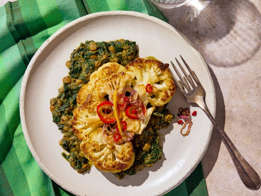 Cauliflower Steaks over Split Pea Dal - Maya Kaimal